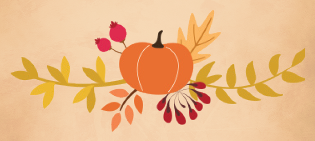 a pumpkin with leaves and branches in the background